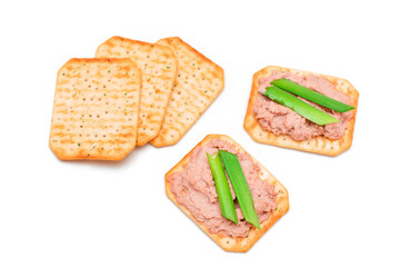 Crispy Salted Cracker with Liver Pate and Green Onions - Isolated on White. Easy Snack - Isolation