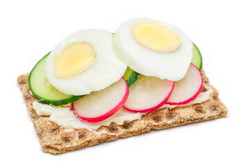 Whole Grain Crispbread with Fresh Cucumber, Egg, Cream Cheese and Radish - Isolated on White. Quick and Healthy Sandwiches. Crispbread with Tasty Filling. Healthy Dietary Snack - Isolation