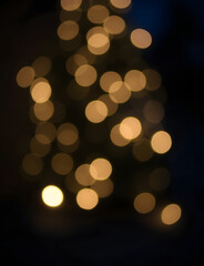 Obraz premium Defocused Christmas lights are a sad sight on winter nights.