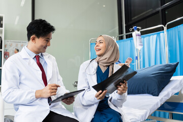 Medical team working on digital tablet healthcare doctor technology tablet using computer analyzed the results of medical reports at the hospital.