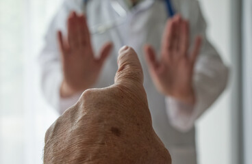 Stop medical staff abuse. Threatening behaviour towards a doctor, Physician. Angry and violent...