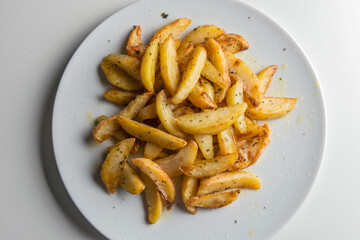 Plate of flavored French fries