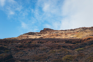 Mountain Range Landscape with Blue Sky and Clouds