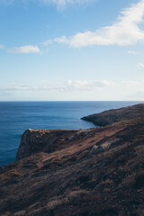 Rocky Coastline with Blue Ocean and Sky