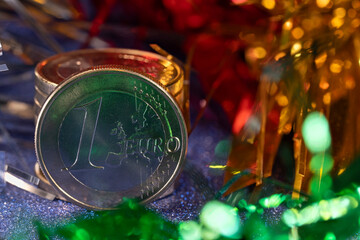 One 1 Euro coin with Christmas decorations