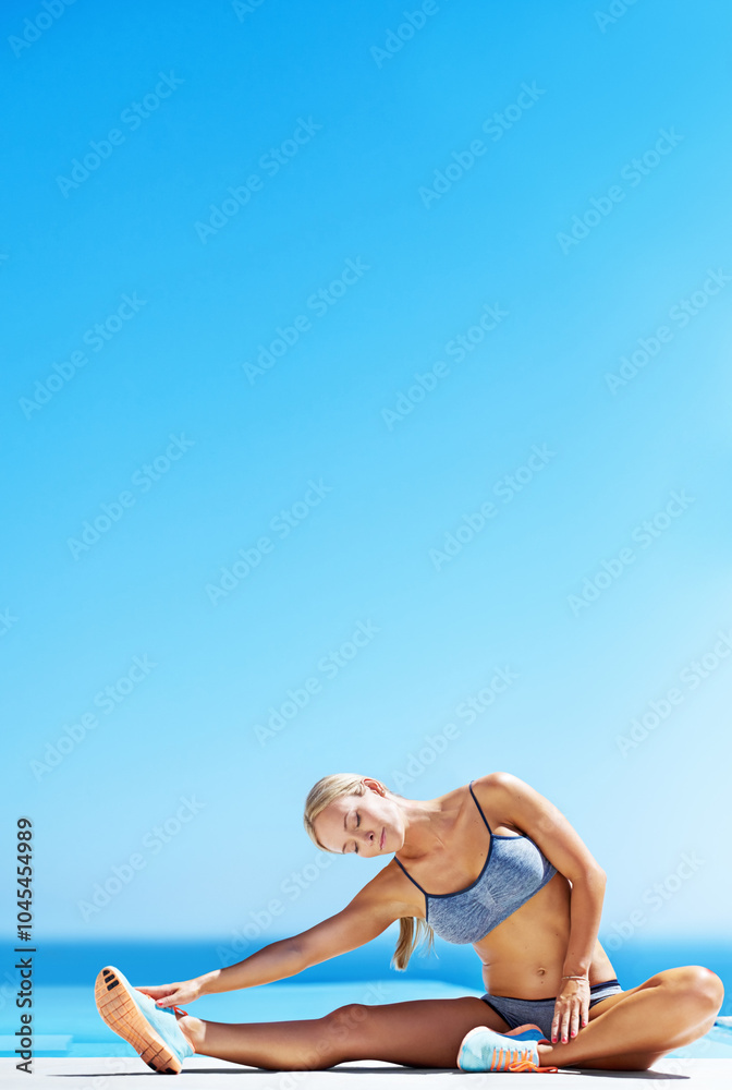 Wall mural Woman, blue sky and stretching for training, workout and sports activity outdoor with fitness on patio. Athlete, exercise and legs development for health, flexibility and strength with mockup space