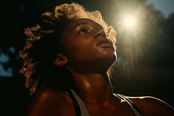 A black teenage girl playing sport adult woman contemplation.