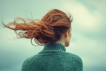 Woman with Flowing Hair in Sweater