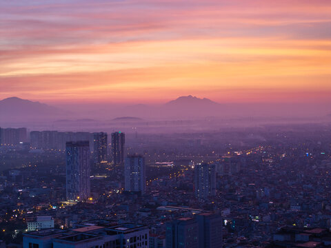 Aerial view of Hanoi city in beautiful sunset - Powered by Adobe