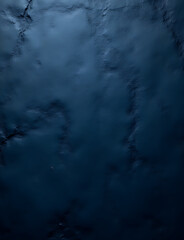 Rough dark blue textured stone or concrete for a unique background design element in graphic work.