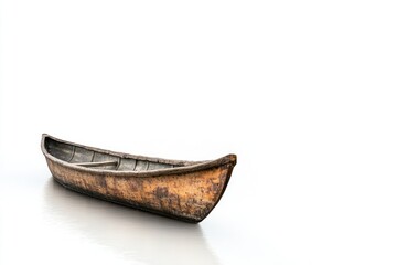 A small wooden boat sits on a white surface