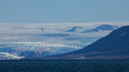 Nordenskiold Glacier overview captured from the water against a backdrop of rugged mountains