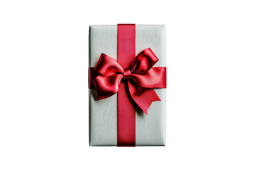 A top-down perspective of a classic gift box adorned with a striking red bow, set against a subtle light grey backdrop.