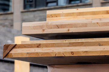 Close up edge detail of glue laminated floor and wall panels for sustainable,  green, multi story...