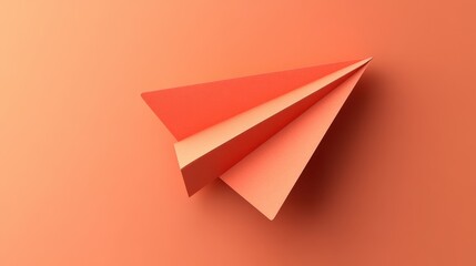 A vibrant origami paper airplane rests against a warm coral backdrop, symbolizing creativity and carefree imagination