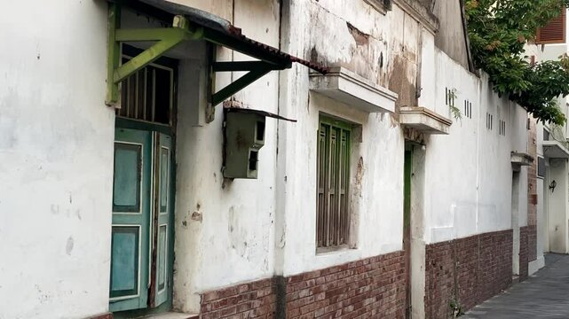 The side wall of an old house in a small alley in Yogyakarta, Kota Gede, Javanese