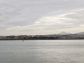 Naklejka premium The view of Hendaye village in France from Hondarribia, Spain
