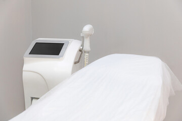 Laser hair removal treatment. Clinic skin care procedure. Medical dermatology photo equipment....