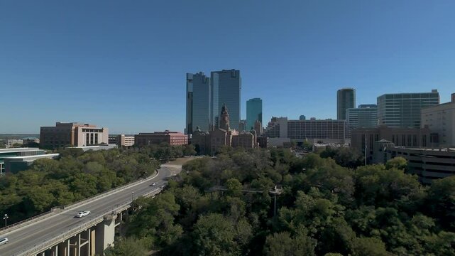 Fort Worth, TX USA - October 19, 2024: Aerial drone video of Main Street Bridge leading towards the Tarrant County Courthouse. 