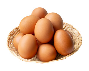 Top view of group of fresh brown chicken eggs in stack in wicker basket isolated on white background with clipping path