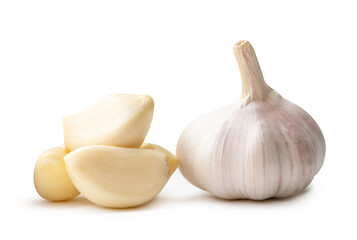 Side view of white garlic bulb with peeled cloves in stack isolated on white background with clipping path