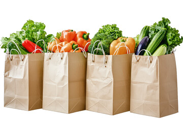 Collection of paper shopping bags full of mixed veggies on a clear background.