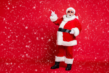 Full length body size view of his he amazed funky fat overweight plump gray-haired bearded man showing black Friday ad advert copy space isolated over bright vivid shine red background