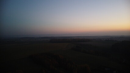 sunset or sunrise on the horizon, traditional autumn day background.