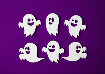 Handcrafted Felt Halloween Decorations on Dark Violet Background – Set of Spooky Felt Ghosts for DIY Craft Projects, Seasonal Party Decorations, and Festive Home Decor
