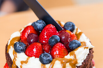 Strawberry and blueberry chocolate birthday cake