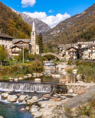 The beautiful village of Fontainemore in the Lys Valley during fall season. Aosta Valley, northern Italy.