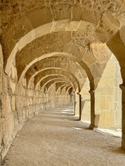 Arched hallway on top of the Roman theater in ancient Greco-Roman city of Aspendos, Turkey