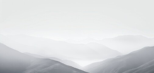 Serene Monochrome Mountain Landscape with Soft Mist and Layered Peaks