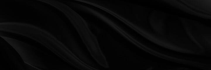 Black gray satin dark fabric texture luxurious shiny that is abstract silk cloth background with patterns soft waves blur beautiful.
