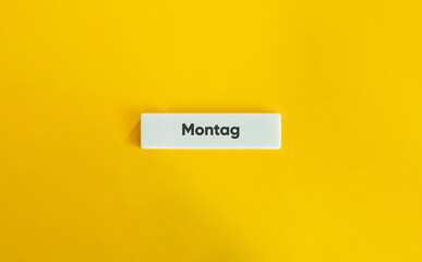 Monday, Word and Banner. German Text on Block Letter Tiles on Flat Background. Minimalist Aesthetics.