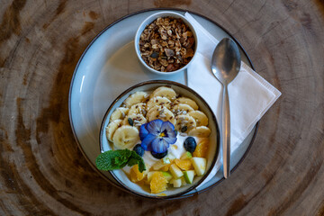 A delicious and healthy granola bowl breakfast to start the day right. Healthy eating choices