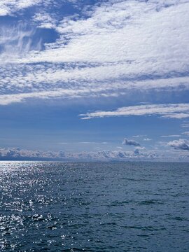 Glittering sea and beautiful cloudy sky