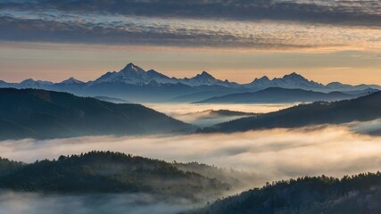 Obraz premium Misty mountain range at dawn 