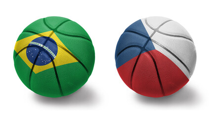 basketball balls with the national flags of czech republic and brazil on the white background.