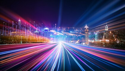 Fototapeta premium City Lights Speed: A mesmerizing cityscape at night, bathed in vibrant light trails from speeding vehicles, evokes a sense of dynamic energy and forward momentum. 