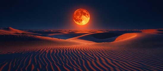 A serene desert landscape illuminated by a large, glowing moon.