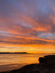 Dramatic sunset over the sea with beautiful colors and shades