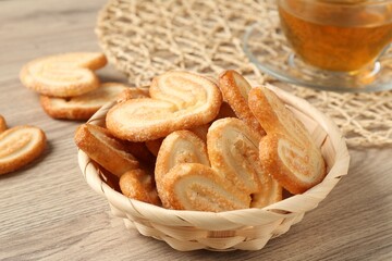 Delicious sweet palmier cookies on wooden table