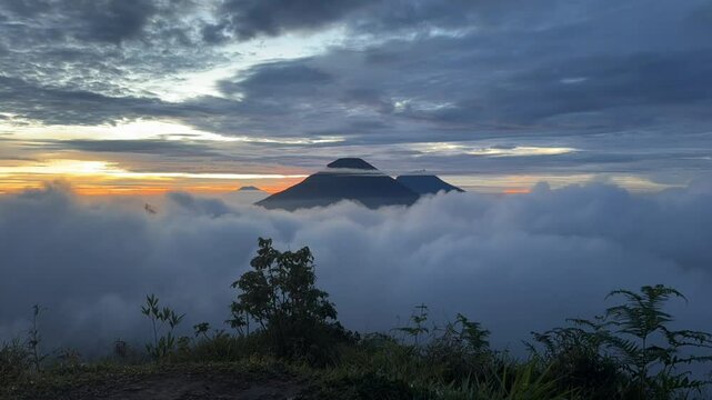 Timelapse footage of Indonesian mountain scenery from Mount Bismo showing from dark to sunrise. Indonesian scenery.