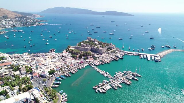 Bodrum District of Mugla, Turkey. Aerial view of Bodrum Castle (Castle of St. Peter). Panoramic view of Bodrum center, marina and castle. Drone shot.