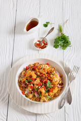 cauliflower chickpea quinoa salad in a white bowl