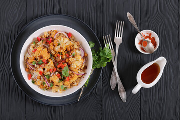 cauliflower chickpea quinoa salad in a white bowl