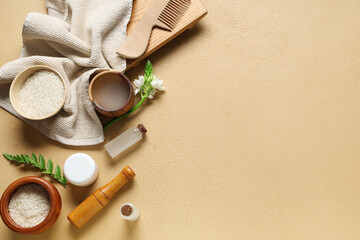 Composition with rice water, grains and bath supplies on color background