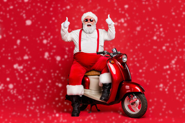 Portrait of his he nice bearded cheerful cheery funky confident Santa Claus hipster sitting on...