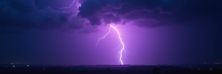 Stunning lightning strike illuminating a stormy sky over a serene landscape. Perfect for weather-related content, nature themes, or dramatic visuals.
